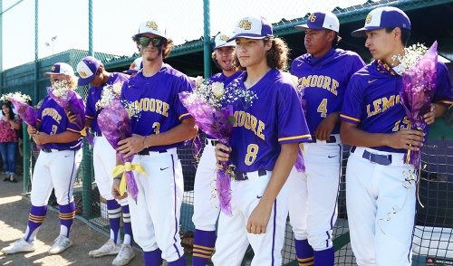 Lemoore's senior baseball players ready to present flowers to mothers in the Tigers' final regular season game.